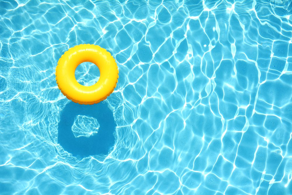 yellow pool floaty in water
